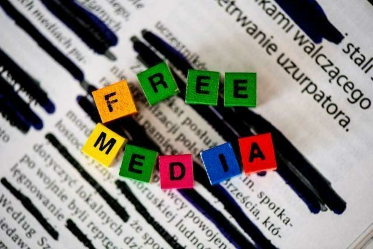 Image of a censored newspaper, with free media as banner shown on top of it